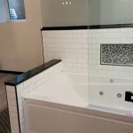 photo of a bathtub in the Marshal basement, designed and built by KMA Building in Winnipeg, MB