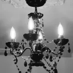 photo of a chadelier in the Marshal basement, designed and built by KMA Building in Winnipeg, MB