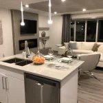 photo of the centre island in the "Barker" kitchen designed and built by KMA Building in Winnipeg, MB