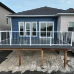 photo of the "Field House" deck, a composite deck designed and built by KMA Building in Winnipeg, MB