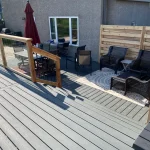 photo of the "Heloise" deck, a composite deck designed and built by KMA Building in Winnipeg, MB