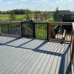 photo of the "Heloise" deck, a composite deck designed and built by KMA Building in Winnipeg, MB