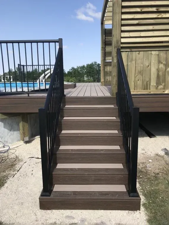 photo of the "Rossmore" deck, a composite pool deck designed and built by KMA Building in Winnipeg, MB